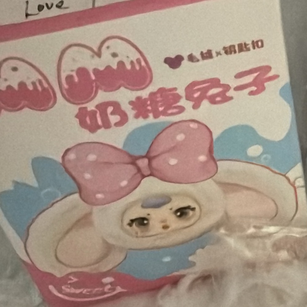 Pink and White Stuffed Animal Toy